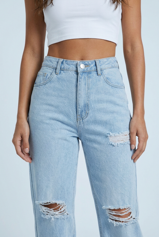 Light Wash jeans dritti vita alta slavato strappati ginocchio closeup